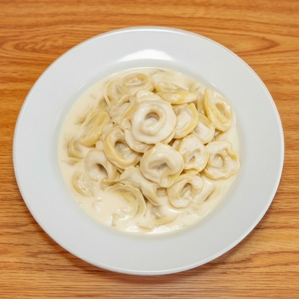 Cheese Tortellini and 4 Cheese Sauce.