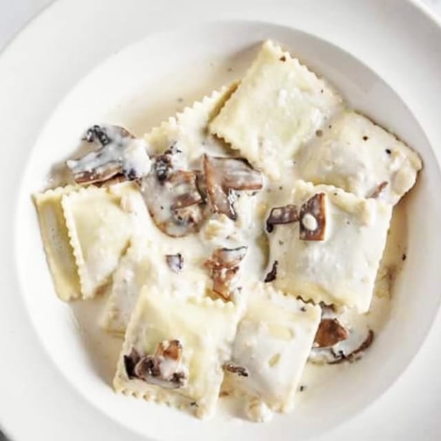 Porcini Mushroom Ravioli in Mushroom cream sauce.